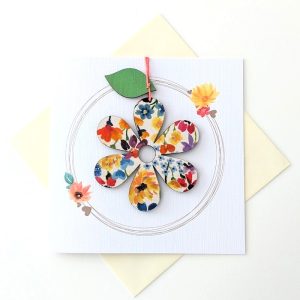 CARD WITH WOODEN FLOWER DECORATION